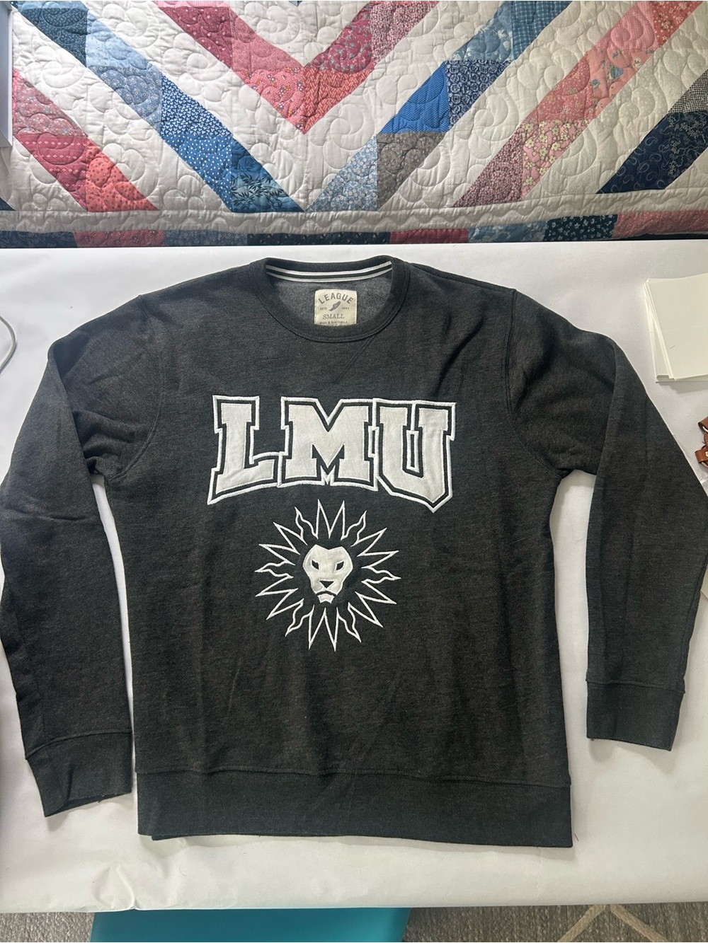 League Black Crewneck with LMU Lettering and Lion Graphic